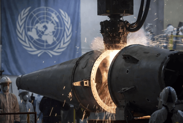 Workers dismantling a decommissioned missile during the nuclear disarmament process that led to the Budapest Memorandum